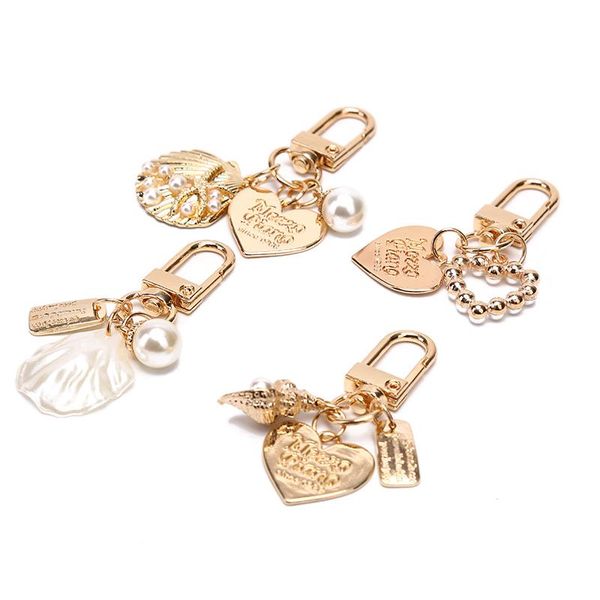 keychains 1pcs marine metal letter peach heart seashell faux pearl stunning charm keyrings for wedding party mom bag pendant keyring, Silver 
keychains 1pcs marine metal letter peach heart seashell faux pearl stunning charm keyrings for wedding party mom bag pendant keyring, Silver