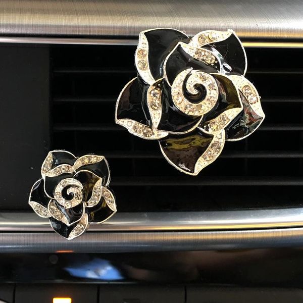 creative vehicle mounted ornaments, camellias, vent, perfume clip car accessories for girls air freshener
creative vehicle mounted ornaments, camellias, vent, perfume clip car accessories for girls air freshener
