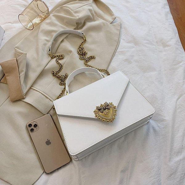 evening bags 2021 high-quality -selling metal decorative small square bag ladies fashion trend shoulder messenger
evening bags 2021 high-quality -selling metal decorative small square bag ladies fashion trend shoulder messenger