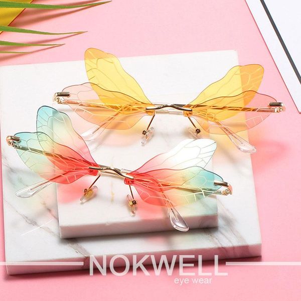 fashion rimless sunglasses women designer dragonfly clear lens steampunk glasses a66, White;black
fashion rimless sunglasses women designer dragonfly clear lens steampunk glasses a66, White;black