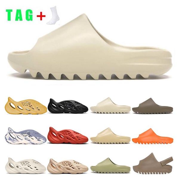 2021 kanye slides shoes slippers moon grey platform sandals sneakers mens womens foam runner desert sand resin orange bone fashion trainersz, Black
2021 kanye slides shoes slippers moon grey platform sandals sneakers mens womens foam runner desert sand resin orange bone fashion trainersz, Black