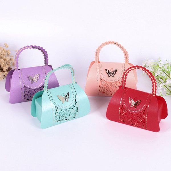 gift wrap 50pcs creative wedding favors and gifts candy box openwork butterfly tote bag paper boxes for favours
gift wrap 50pcs creative wedding favors and gifts candy box openwork butterfly tote bag paper boxes for favours