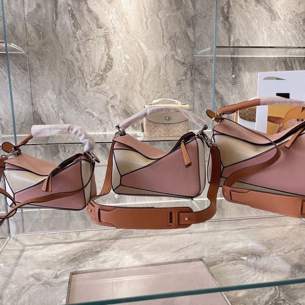 lo yi 2021 new hand pillow bucket geometry hand cross women's color matching bag head leatherlte8
lo yi 2021 new hand pillow bucket geometry hand cross women's color matching bag head leatherlte8