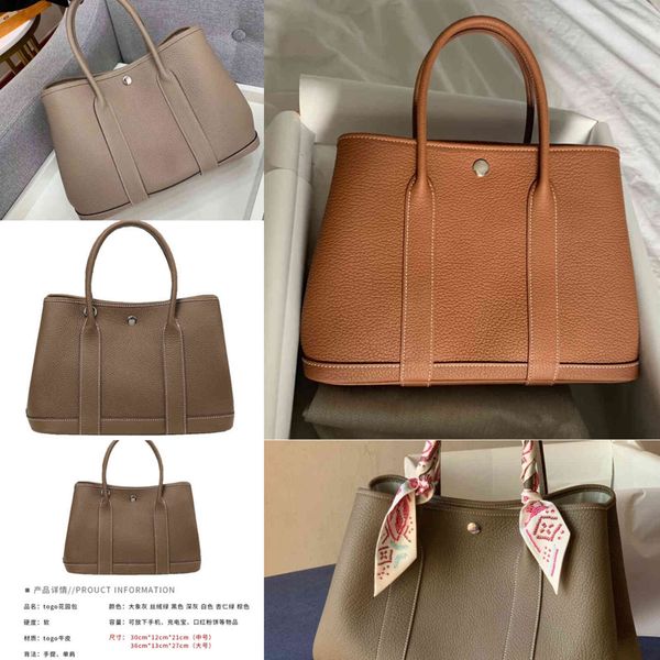 design new togo leather women's bag sling shoulder tote bag versatile garden portable shopping bucket purses outlet
design new togo leather women's bag sling shoulder tote bag versatile garden portable shopping bucket purses outlet