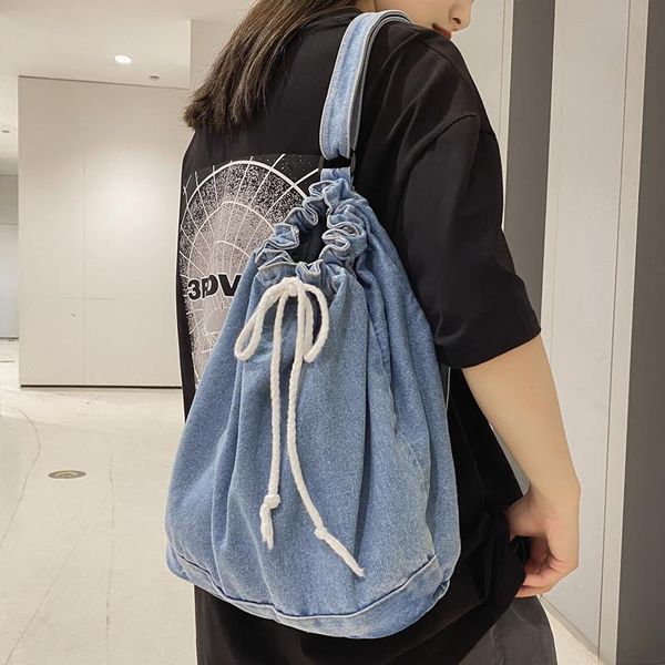 backpack original uoct.all ins high school students harajuku style leisure travel drawstring denim bucket bag female
backpack original uoct.all ins high school students harajuku style leisure travel drawstring denim bucket bag female