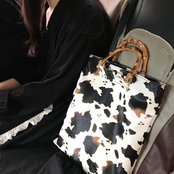 evening bags bamboo handle cow pattern pu leather high capacity handbags for women 2021 female shoulder totes
evening bags bamboo handle cow pattern pu leather high capacity handbags for women 2021 female shoulder totes