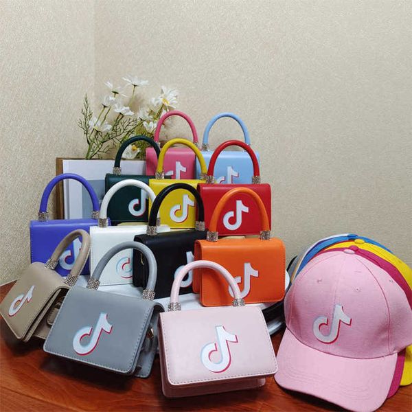tiktok 2022 fashion trendy children's bag + ball cap autumn winter candy colors boys girls one-shoulder bags baseball hats two-piece su, Black
tiktok 2022 fashion trendy children's bag + ball cap autumn winter candy colors boys girls one-shoulder bags baseball hats two-piece su, Black