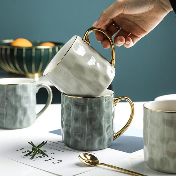 350ml golden handle ceramic mug tumbler breakfast milk coffee cup home kitchen juice concave-convex surface mugs
350ml golden handle ceramic mug tumbler breakfast milk coffee cup home kitchen juice concave-convex surface mugs