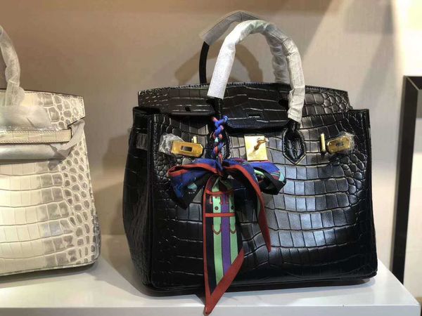 high-definition genuine leather handbag female togo li pattern layer cowhide semi-handmade wax thread 25 30 35 cm bag
high-definition genuine leather handbag female togo li pattern layer cowhide semi-handmade wax thread 25 30 35 cm bag