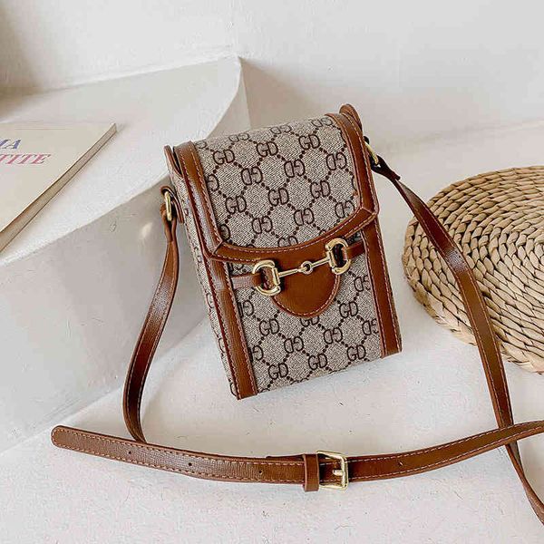 design s 1955 rank buckle mobile phone fashion new box small versatile one shoulder mini bag trendy women's bag
design s 1955 rank buckle mobile phone fashion new box small versatile one shoulder mini bag trendy women's bag