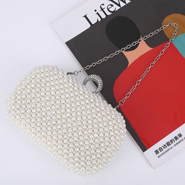 european and american style creative women's holding pearl dinner bag evening diagonal main push bags
european and american style creative women's holding pearl dinner bag evening diagonal main push bags