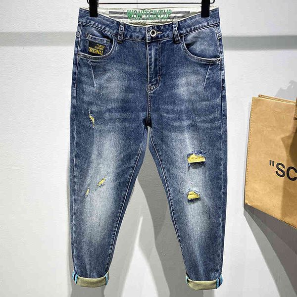 jeans spring summer fashion ripped hole yellow stitching men middle waist do the old washed personality stretch blue trousers
jeans spring summer fashion ripped hole yellow stitching men middle waist do the old washed personality stretch blue trousers