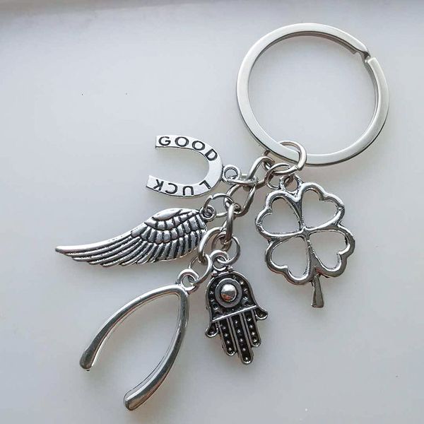 keychains fashion new hand fatima wings clover good luck horseshoe fish bone pendant key chain ring keychain package decoration gift 1pcs, Silver
keychains fashion new hand fatima wings clover good luck horseshoe fish bone pendant key chain ring keychain package decoration gift 1pcs, Silver