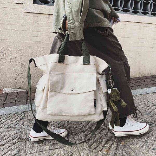 shopping bags fashion women's luxury design handbags new large capacity canvas shoulder casual messenger big tote 220307
shopping bags fashion women's luxury design handbags new large capacity canvas shoulder casual messenger big tote 220307