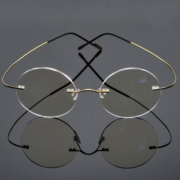 sunglasses 2021 alloy frameless round ultra-light anti-blue light reading glasses myopia lens, White;black 
sunglasses 2021 alloy frameless round ultra-light anti-blue light reading glasses myopia lens, White;black