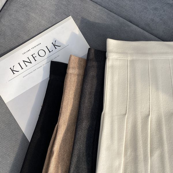 autumn and winter half women's 2021 wool jk high waist short pleated college black a-line trouser skirt
autumn and winter half women's 2021 wool jk high waist short pleated college black a-line trouser skirt