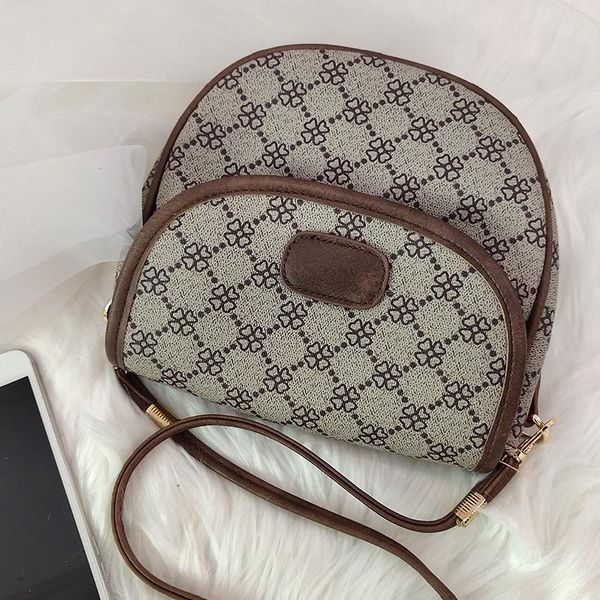 evening bags women's shoulder bag cute round saddle vintage floral letter pattern crossbody handbag wholesale 2021 fashion female
evening bags women's shoulder bag cute round saddle vintage floral letter pattern crossbody handbag wholesale 2021 fashion female