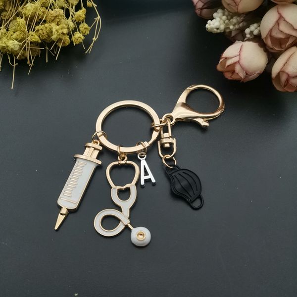 new keychain doctor medical tool stethoscope syringe mask key ring nurse medical student gift keychain souvenir a-z letters, Silver
new keychain doctor medical tool stethoscope syringe mask key ring nurse medical student gift keychain souvenir a-z letters, Silver