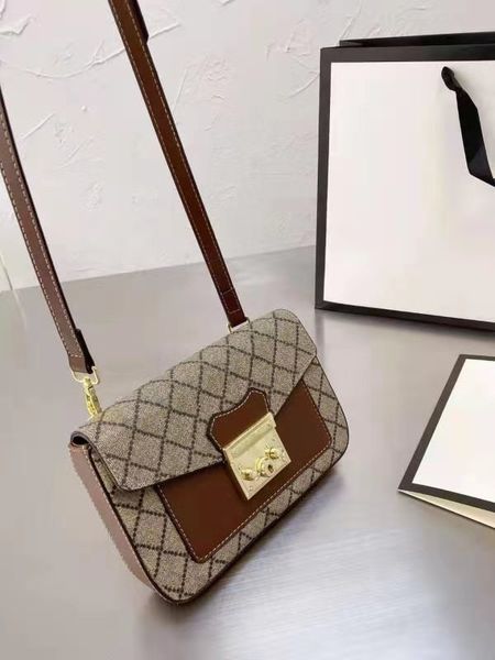 designer bag cross body wallet with letters and floral patterns.