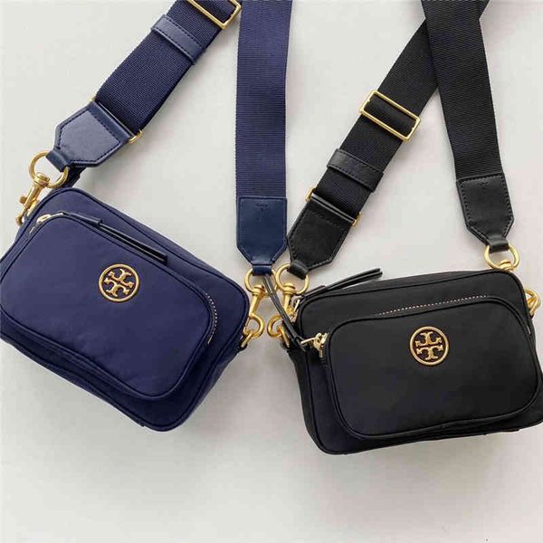 tb new women's piper mini nylon single messenger bag 73533 wide edge webbing shoulder strap small camera
tb new women's piper mini nylon single messenger bag 73533 wide edge webbing shoulder strap small camera