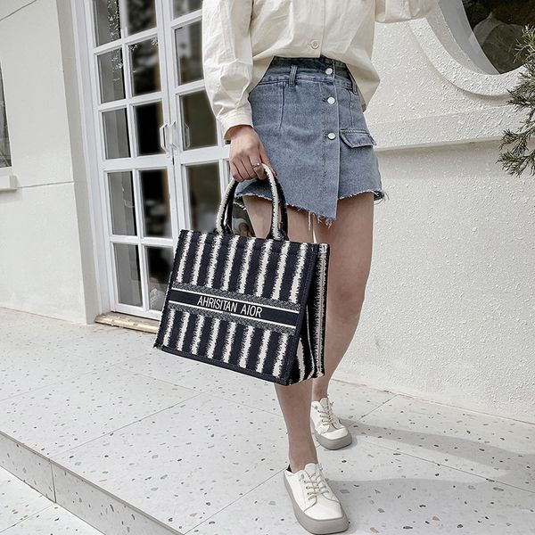 canvas bag large capacity new portable stripe tote bag simple letter shoulder outlet purse
canvas bag large capacity new portable stripe tote bag simple letter shoulder outlet purse