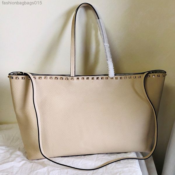 large stud shopping bag tote women handbags rivet shoulder bags grain calfskin leather fashion letter magnetic closure interior zipper a-001
large stud shopping bag tote women handbags rivet shoulder bags grain calfskin leather fashion letter magnetic closure interior zipper a-001