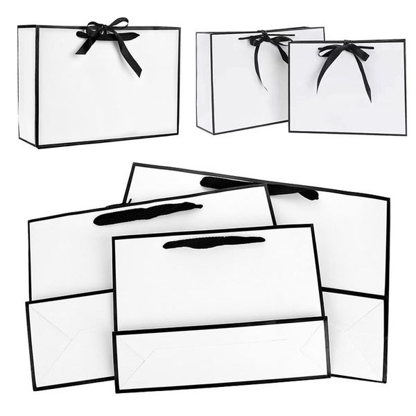 gift wrap luxury portable black frame white cardboard bag for business wedding holiday wrapping materials with bow
gift wrap luxury portable black frame white cardboard bag for business wedding holiday wrapping materials with bow