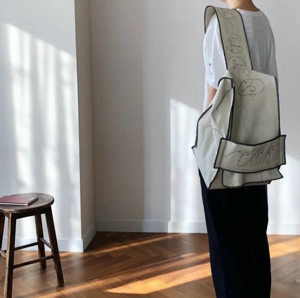 women's line embroidery crossbody shoulder bag niche design canvas bags
women's line embroidery crossbody shoulder bag niche design canvas bags