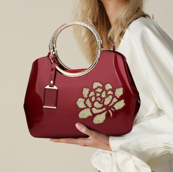 fashion patent leather ladies handbag diagonal bag large capacity shoulder rose flower classic shell evening bags
fashion patent leather ladies handbag diagonal bag large capacity shoulder rose flower classic shell evening bags