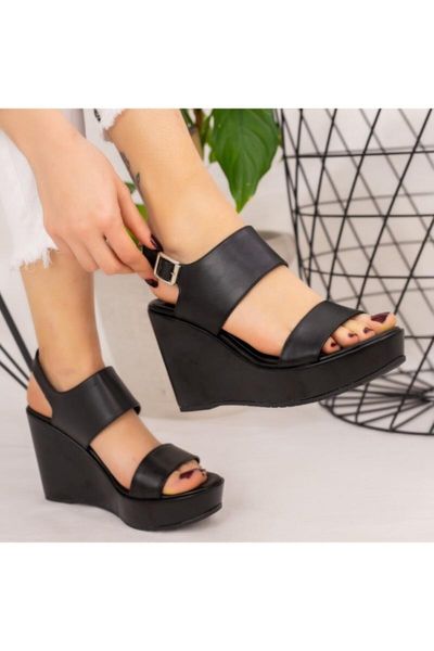 sandals women's black skin wedges
sandals women's black skin wedges