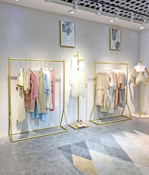 clothing store display shelf gold rack women's floor type clothes hanger does not drop paint hooks & rails
clothing store display shelf gold rack women's floor type clothes hanger does not drop paint hooks & rails