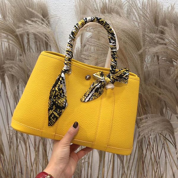 70% off luxury design handbag 2021 new cowhide women's single shoulder slant span simple garden portable big shopping bag bucket bag rj 
70% off luxury design handbag 2021 new cowhide women's single shoulder slant span simple garden portable big shopping bag bucket bag rj