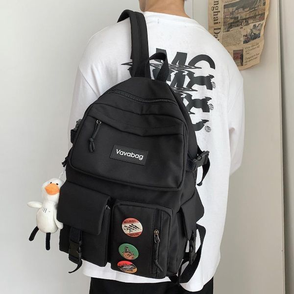 large capacity boys and girls students cute badge backpack korean leisure fashion schoolbag nylon waterproof travel bag cool
large capacity boys and girls students cute badge backpack korean leisure fashion schoolbag nylon waterproof travel bag cool
