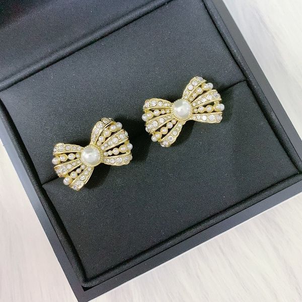 c2156 light luxury fashion bow earrings accessories rhinestone size rice pearl earrings wholesale ladies wedding jewelry, Golden;silver
c2156 light luxury fashion bow earrings accessories rhinestone size rice pearl earrings wholesale ladies wedding jewelry, Golden;silver
