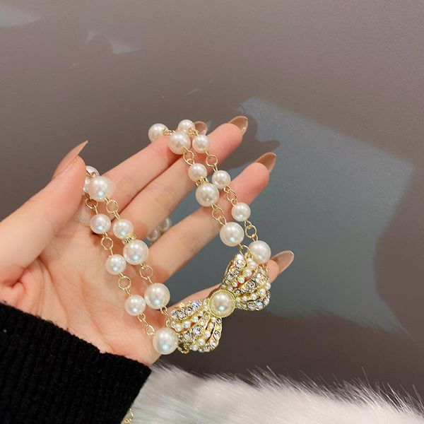 chokers white pearl bowknot necklace elegant female prom party korea fashion jewelry, Golden;silver
chokers white pearl bowknot necklace elegant female prom party korea fashion jewelry, Golden;silver