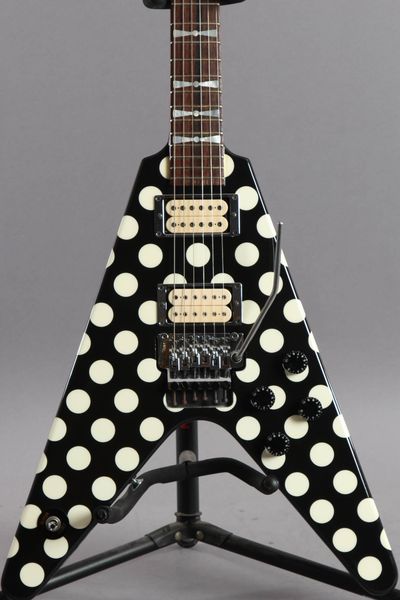 jack son randy rhoads polka dot black flying v electric guitar mop bowtie inlays, floyd rose tremolo bridge & locking nut, whammy bar, signa 
jack son randy rhoads polka dot black flying v electric guitar mop bowtie inlays, floyd rose tremolo bridge & locking nut, whammy bar, signa