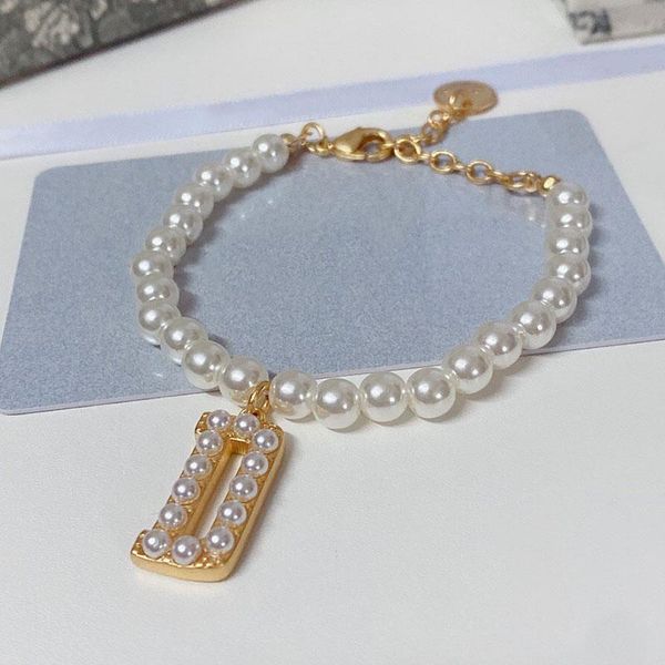 charm bracelets 2021 1:1 logo famous fashion brand letter d pearl bracelet ladies luxury jewelry trend party gift, Golden;silver
charm bracelets 2021 1:1 logo famous fashion brand letter d pearl bracelet ladies luxury jewelry trend party gift, Golden;silver