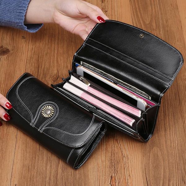 wallets woman long wallet cowhide large capacity mobile phone bag two-fold oil wax cow leather woman's, Red;black
wallets woman long wallet cowhide large capacity mobile phone bag two-fold oil wax cow leather woman's, Red;black