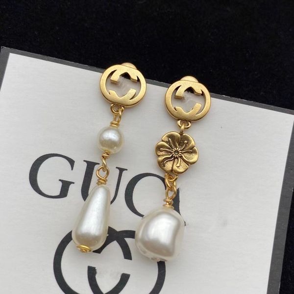design ancient water drop pearl pendant asymmetric long tassel classic letter hollowed out ancient gold flower earrings, Golden
design ancient water drop pearl pendant asymmetric long tassel classic letter hollowed out ancient gold flower earrings, Golden
