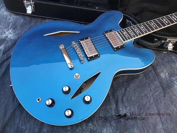 custom shop metallic blue semi hollow body jazz electric guitar dual diamond holes, split diamond inlay, grover tuners ,dave grohl dg
custom shop metallic blue semi hollow body jazz electric guitar dual diamond holes, split diamond inlay, grover tuners ,dave grohl dg