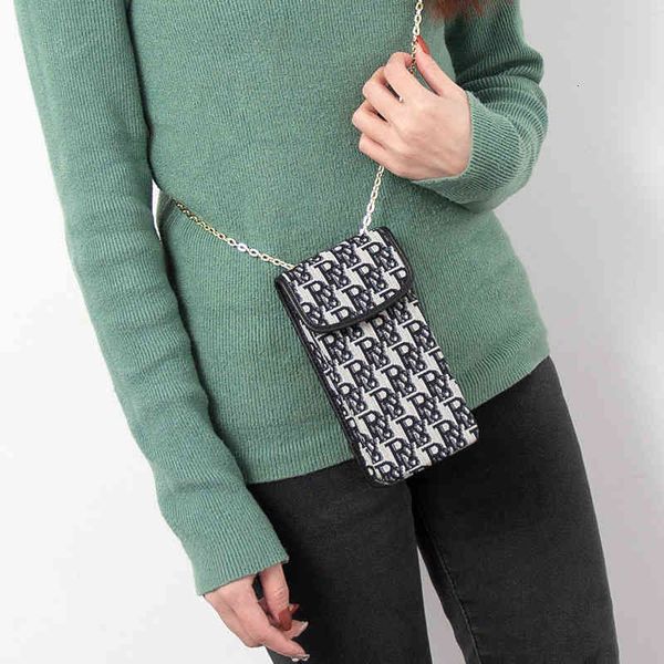 handbag 2021 mobile phone bag women's canvas mini chain xiangbulei vertical messenger wallet, Black;red
handbag 2021 mobile phone bag women's canvas mini chain xiangbulei vertical messenger wallet, Black;red