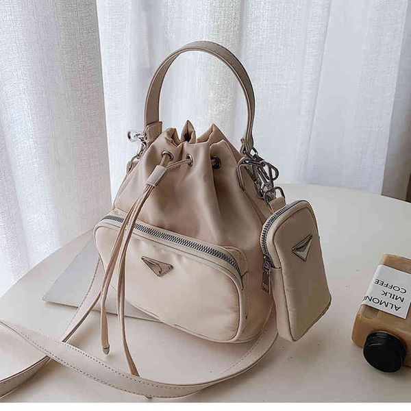 evening bags designer tote cross body shoulder drawstring bag luxury nylon high-quality fashion mother child package different colors size 2
evening bags designer tote cross body shoulder drawstring bag luxury nylon high-quality fashion mother child package different colors size 2