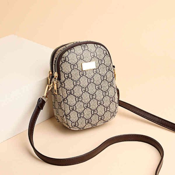 2022 latest luggage factory wholesale mobile bag women's double-layer messenger new versatile mini summer small one shoulder zero walle, Black;red
2022 latest luggage factory wholesale mobile bag women's double-layer messenger new versatile mini summer small one shoulder zero walle, Black;red