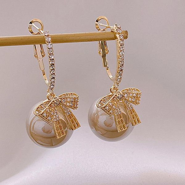 dangle & chandelier fashion gold pearl bowearrings for women vintage metal hoop earings geometric circle drop hanging earring 2021 jewelry, Silver
dangle & chandelier fashion gold pearl bowearrings for women vintage metal hoop earings geometric circle drop hanging earring 2021 jewelry, Silver