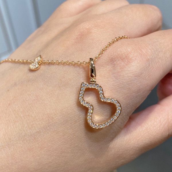 kirin hollow out necklace 925 sterling silver plated 18k rose gold inlaid with diamond double gourd pendant
kirin hollow out necklace 925 sterling silver plated 18k rose gold inlaid with diamond double gourd pendant