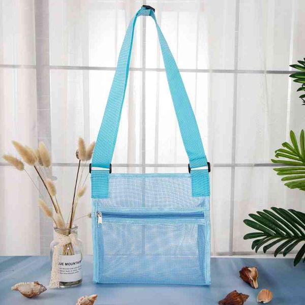 2021 new children's beach shell single shoulder mesh hand sand digging storage mesh bag
2021 new children's beach shell single shoulder mesh hand sand digging storage mesh bag