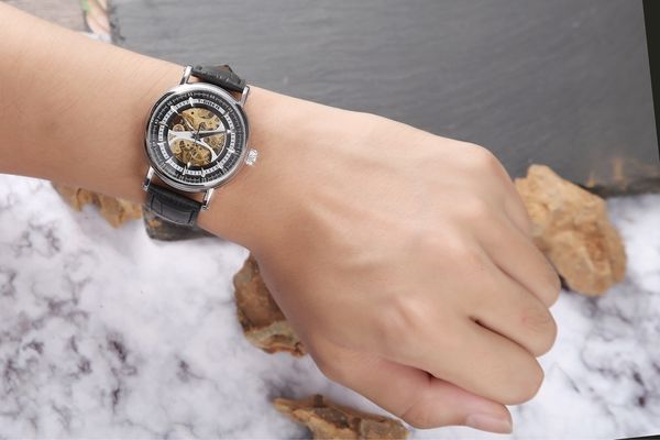 tgoer mechanical watch fashion business machinery hollow out korean belt watch, Slivery;brown
tgoer mechanical watch fashion business machinery hollow out korean belt watch, Slivery;brown