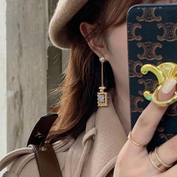 dangle & chandelier design everyday perfume bottle drop earrings korean fashion wild long style statement for women., Silver
dangle & chandelier design everyday perfume bottle drop earrings korean fashion wild long style statement for women., Silver