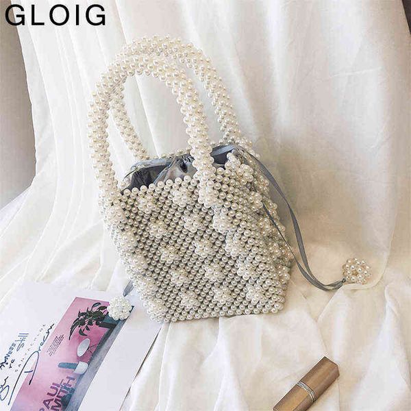 evening bags hollow out fashion beading women clutch purse flower pearl handmade style bucket design handbags with evening bags wallets 2203
evening bags hollow out fashion beading women clutch purse flower pearl handmade style bucket design handbags with evening bags wallets 2203