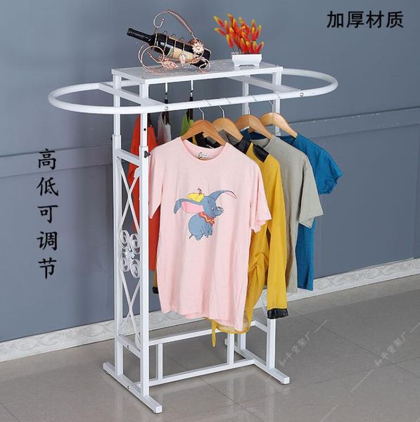 tieyi clothing store oval shelf floor type display rack, parallel bar side hanging middle island boys and girls clothes ha hooks & rails
tieyi clothing store oval shelf floor type display rack, parallel bar side hanging middle island boys and girls clothes ha hooks & rails